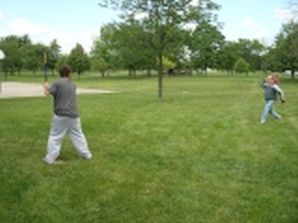 Young John Kish at bat, Jeff Kish pitching, 2011_w.jpg